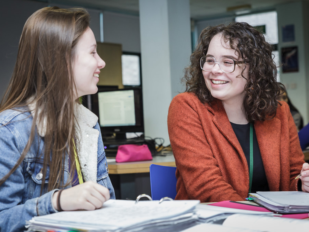 Students in a conversation in a classroom