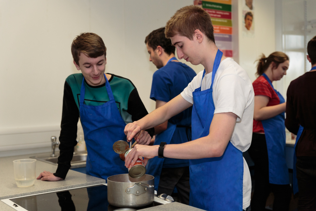 Students cooking a meal