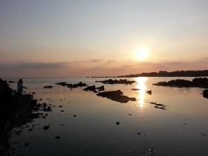 Photograph of a sunset at the beach