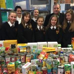 Students with their contributions to the foodbank