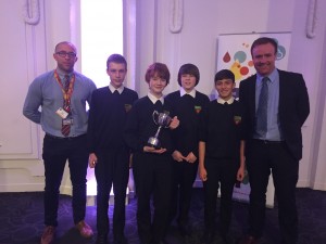 Winning students with their business trophy