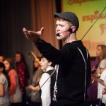 Students performing a song from May Poppins