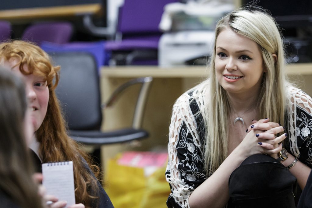 Author Laura Steven talking with students