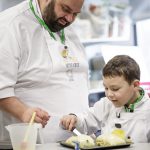 Chef Matei Baran and his son prepare a meal