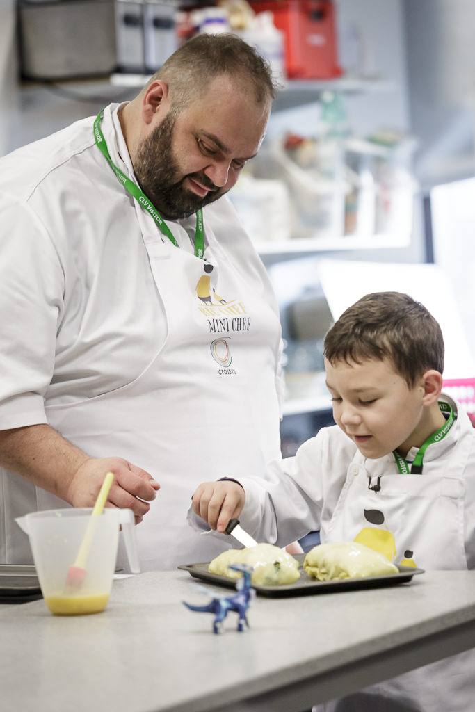 Chef Matei Baran and his son prepare a meal