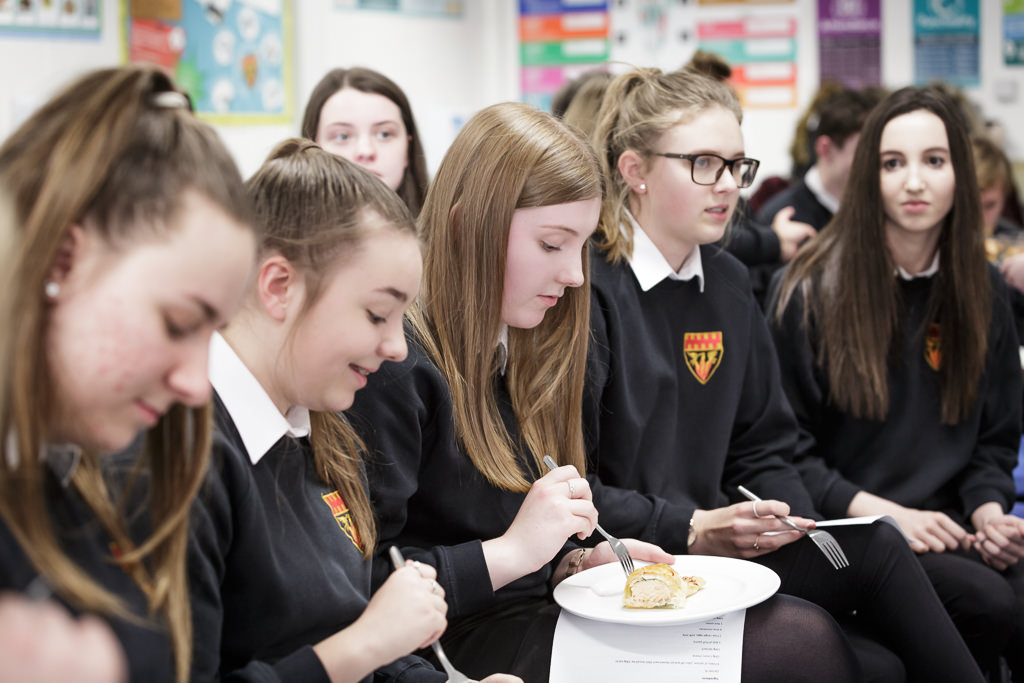 Students sampling cooked food